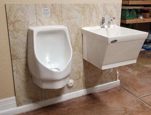 Every mans garage needs a urinal and utility tub.