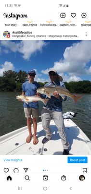 Family action catching redfish