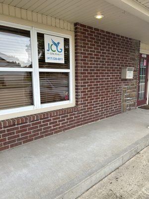 Sign and front of building.