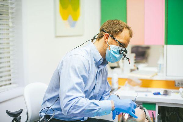 Dr. Will Yoder with a patient.