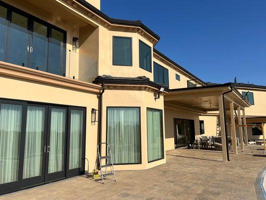 Milgard 4 panels black on black ultra and Ax550 pocket multi slide door on gorgeous 7000 sqf la Canada house