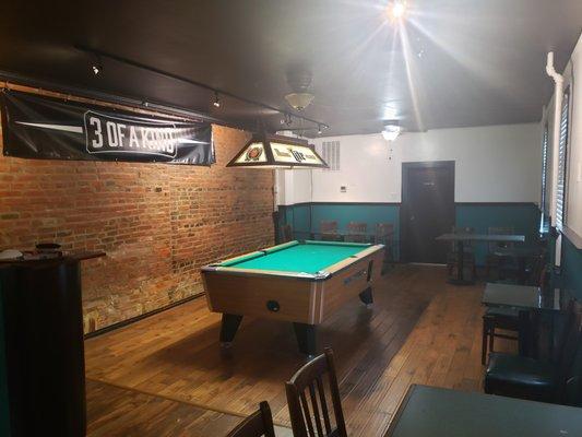 Our pool table is available in the back and we have pool league opportunities.