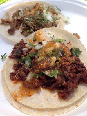 Carnitas and al pastor tacos