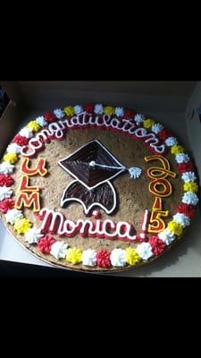 Graduation cookie cake. Wanted maroon and gold, got red and yellow