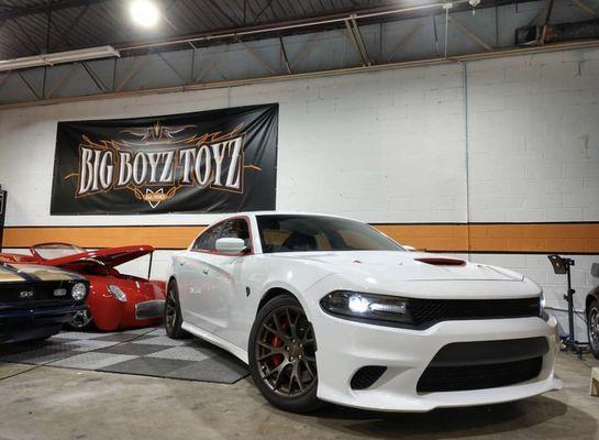 Paint correction and ceramic coating going down on this charger srt8