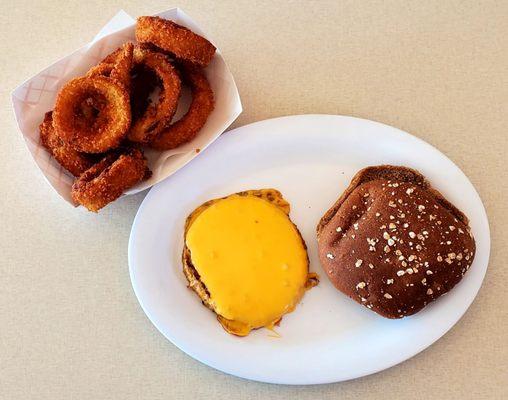 Harvester (add cheese), bun O/S, side order of onion rings.