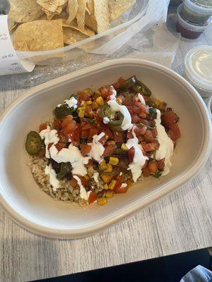 Tiny chicken bowl with "extra" toppings