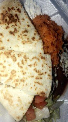 Quesadilla de asada with rice and beans