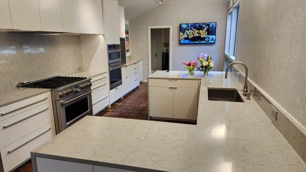 A photo of a kitchen after we cleaned it.