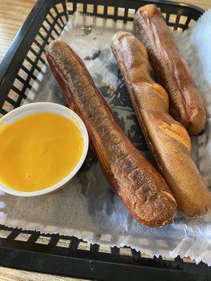 Four pretzel sticks (he ate one very quickly) and spicy cheese dip.