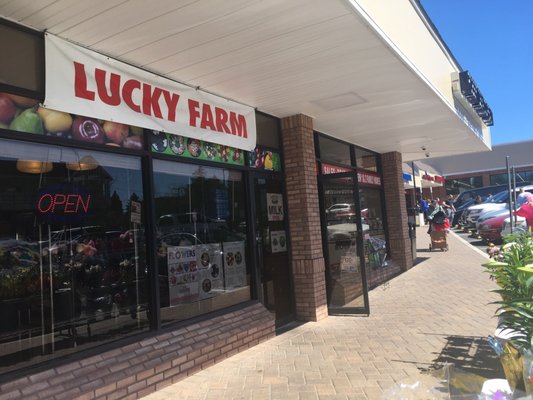 Quaint store with fresh fruits veggies and Asian sauces too