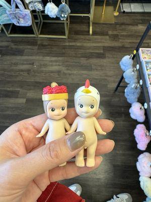 My authentic Sonny Angel on the left and their counterfeit one that they're selling on the right