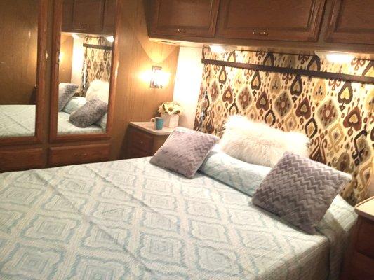 Fleetwood Bounder Master Bedroom with queen bed and plenty of storage.