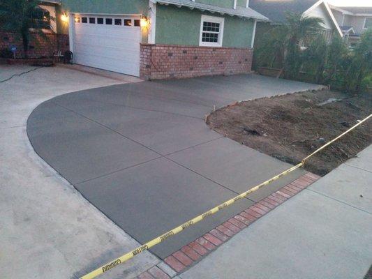 An excellent RV driveway expansion! 5.5" thick with rebar. We are super happy with how it has held up