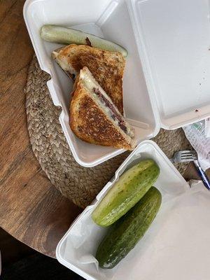 Pastrami grilled cheese and whole pickles