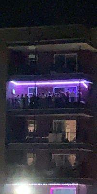 30+ people on one balcony, at midnight, during a school night.