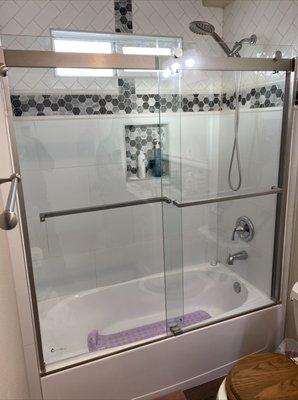 Plumbing services and glass door installation.