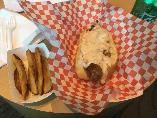 Alligator sausage topped with crawfish