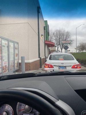 Slowest drive thru ever. They're donuts, hand them out and move the line up.