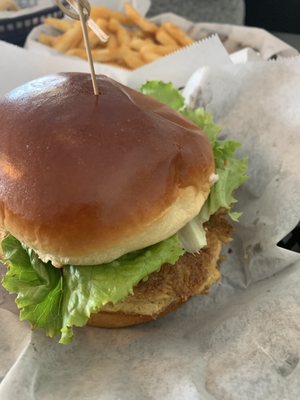 Crab cake sandwich and battered fries