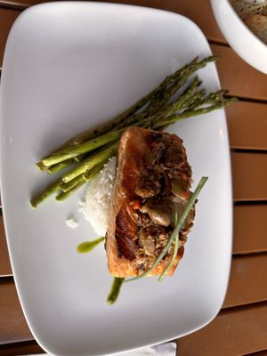 Grilled Salmon, topped with olive tapenade. .