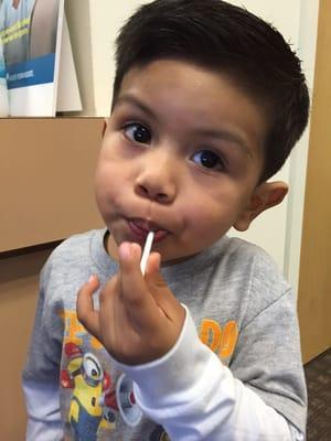 Happy with his lolly