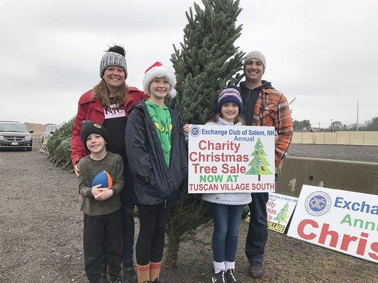 The Hoye family of Windham, NH shopped for their tree early this year, at he Exchange Club of Salem charity Christmas tree sale.