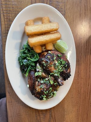 Jerk Chicken with Yucca fries and sautéed greens