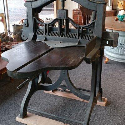 An industrial paper cutter from a newspaper business.