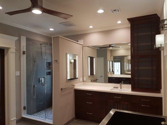 The Construction Phase of this Transformation included enlarging the Shower, installing new Glass Block in Shower Area.