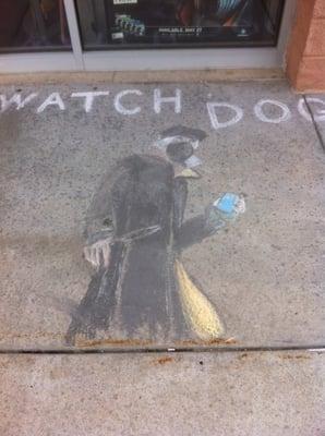 A mural they had on the sidewalk outside of the store, a few ads after watch dogs was released.