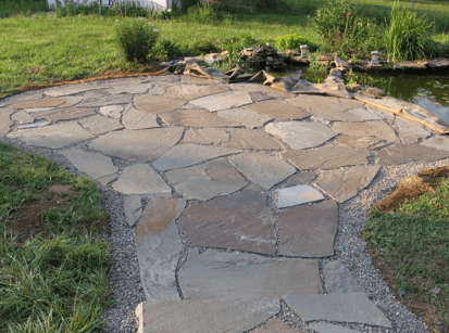 Amazing how a few small pieces of flagstone properly installed in the ground can create enormous peace of mind & tranquility.