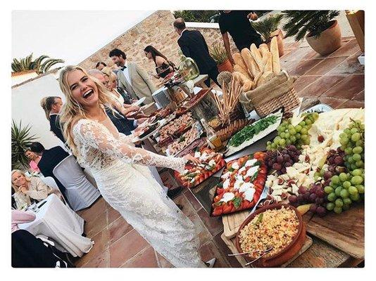 Happy Bride going through the Italian Buffet Line