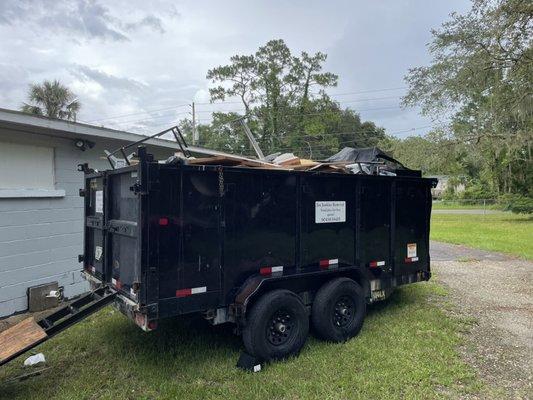 Over 2.5 tons of trash/junk from a 25x12 shed