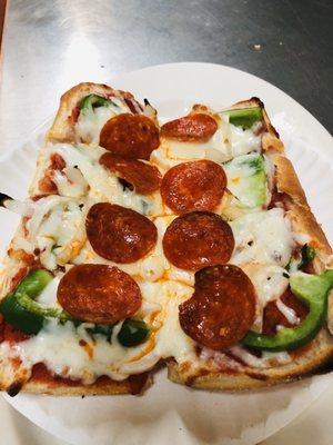 Delicious veggie with pepperoni pizza bread!