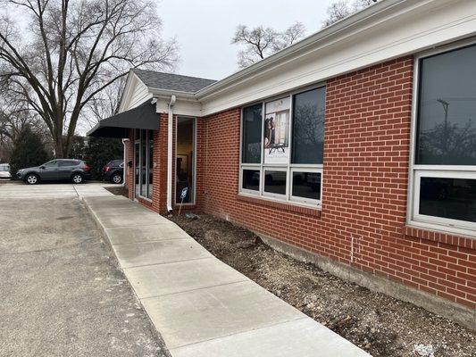 Newly paved sidewalk/ramp