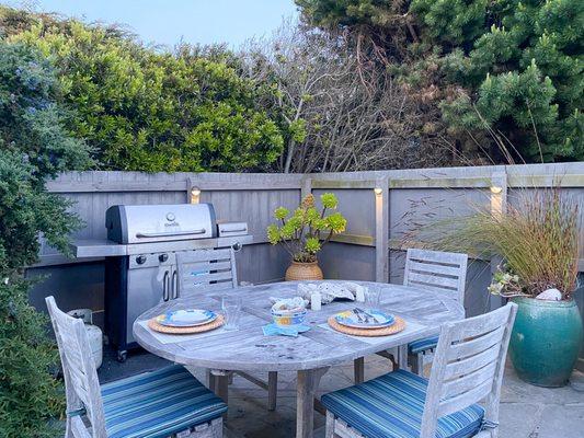 Gas Barbecue, hot tub and teak dining table/chairs