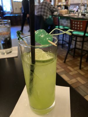 Great bartender made a custom St Patty's Day drink w/coconut rum, midori, pineapple juice & green cherries!