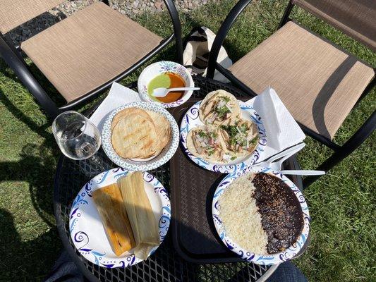 Molé, chicken and veggie tamales, fresh salsas, and chicken tacos.