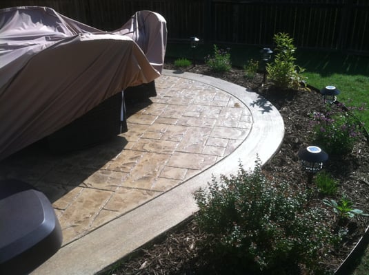 Brown Themed Stamped Patio with Border and Radius Edge