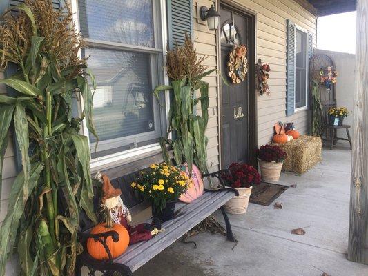 Corn stalks ($5 for a bushel), pumpkins($1 each for pie pumpkins & small white pumpkins), and straw bale ($6)