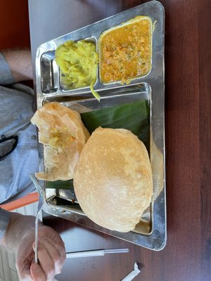 Poori with potato masala and vegetable korma