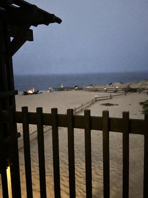 Enjoy a bonfire by the ocean with your family you can add a package for sweet treats!