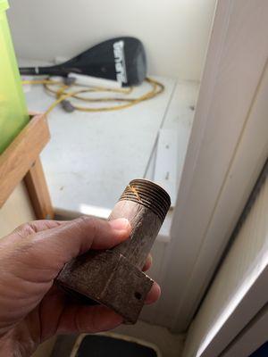 This is the pipe that was removed with apparent slice in it which goes all the way through- looks like it was made with a saw.