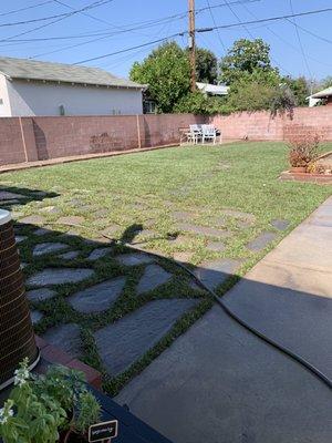 Sod and flagstone installed