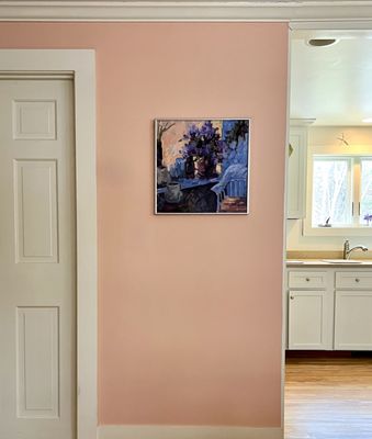 This was a dark space, so I chose a very bright color to work with the paintings, and cheer up the home owner!