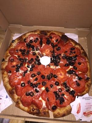 Pepperoni, tomato, and black olives.