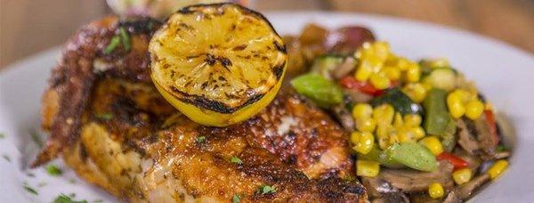 Our Customers love our BRICK CHICKEN flavored with grilled fresh lemon and fresh garlic