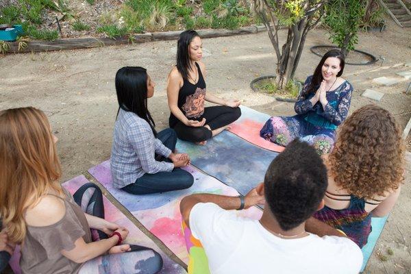 Elysia leading a meditation retreat.