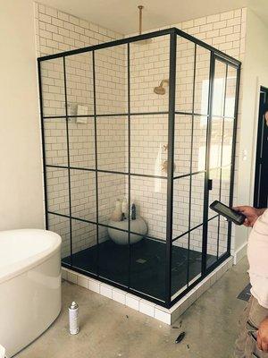 Gridscape style shower enclosure.